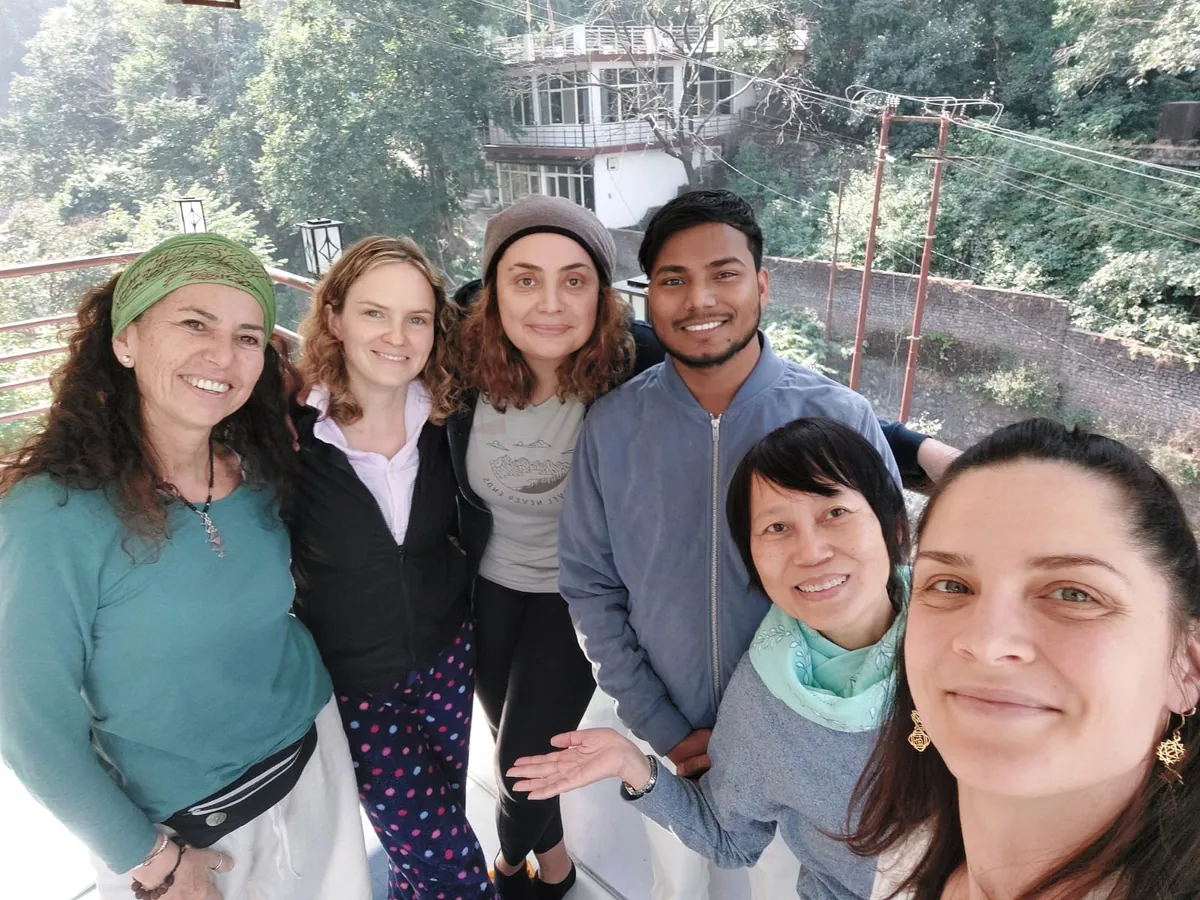 Retreat guests together on a walk through Rishikesh, India
