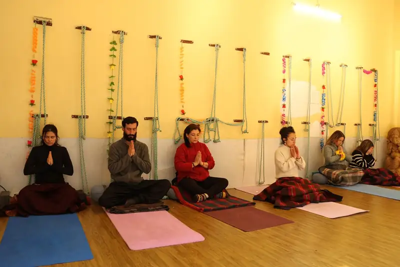 Group yoga practice at Sri Yoga Ashram